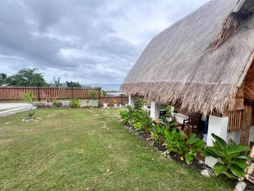 Un jardín fuera de Sondela Cabin Lambug 1BR HuT