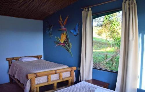 Eco-Bamboo Cottagesにあるベッド