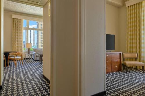 a view of a hotel room with a living room at Courtyard by Marriott Denver Downtown in Denver
