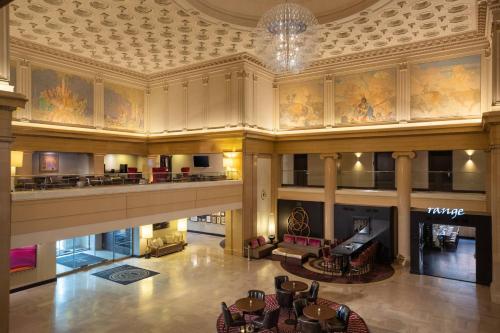 an overhead view of the lobby of a building with a piano at Renaissance Denver Downtown City Center Hotel in Denver