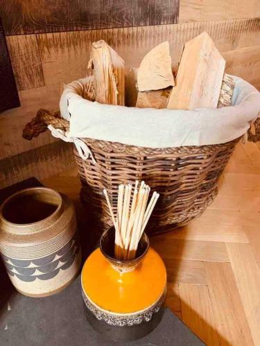 a basket and a bowl with chopsticks on a table at Old Chapel Llanfrynach in Brecon