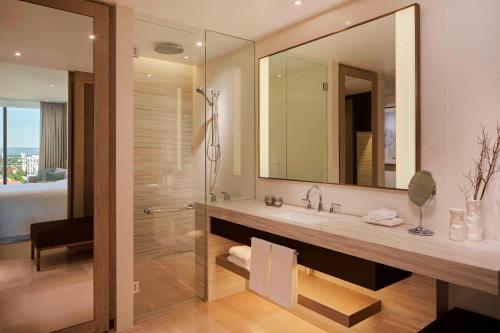 a bathroom with a sink and a mirror at The Westin Perth in Perth