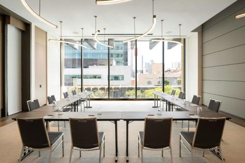a large conference room with a long table and chairs at The Westin Perth in Perth