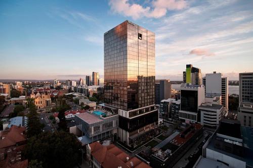 a tall building in the middle of a city at The Westin Perth in Perth