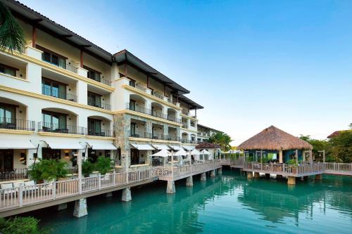 a view of a hotel with a body of water at The Buenaventura Golf & Beach Resort, Autograph Collection in Playa Blanca