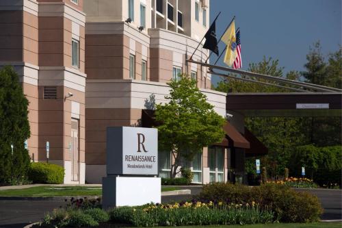 a hotel sign in front of a building at Renaissance Meadowlands Hotel in Rutherford