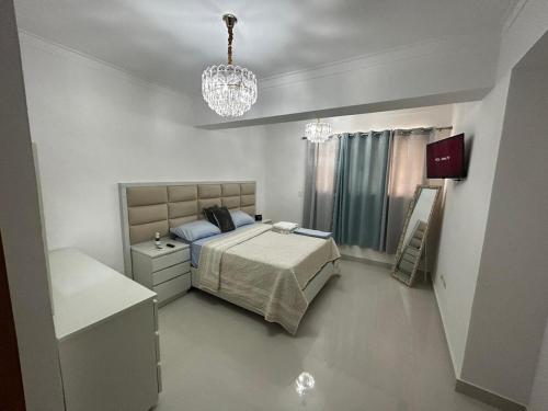 Ένα ή περισσότερα κρεβάτια σε δωμάτιο στο Tu guarida