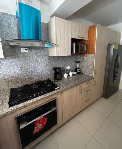 A cozinha ou cozinha compacta de Tu guarida