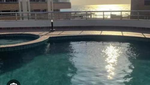 a large pool of water on a building at Flat hotel number one 403 in São Luís