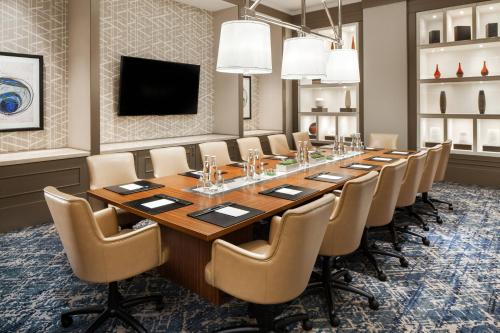 a large conference room with a long table and chairs at Sheraton Grand Seattle in Seattle