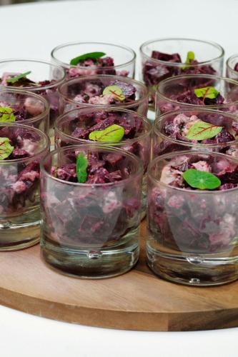 a group of glass cups filled with purple food at Courtyard by Marriott Paris Gare de Lyon in Paris