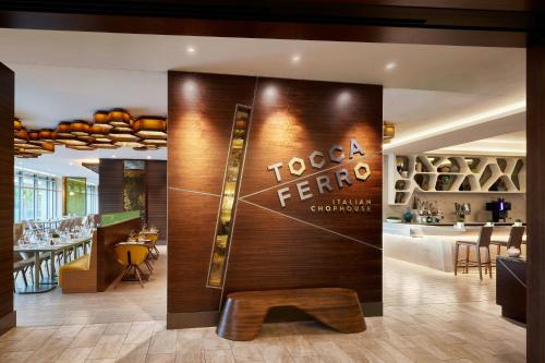a restaurant with a sign that reads toga ferdinand at JW Marriott, Anaheim Resort in Anaheim