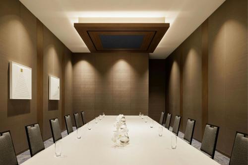 a conference room with a long table and chairs at THE OSAKA STATION HOTEL, Autograph Collection in Osaka