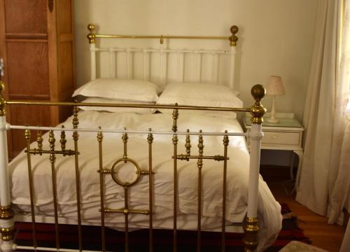 Ένα ή περισσότερα κρεβάτια σε δωμάτιο στο Konka Guest Farm