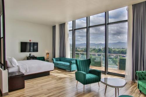 Postel nebo postele na pokoji v ubytování Aloft Ponce Hotel & Casino