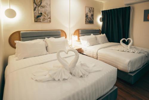 Katil atau katil-katil dalam bilik di Hotel Rue De Siam