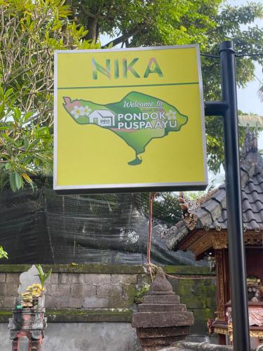 Certifikát, hodnocení, plakát nebo jiný dokument vystavený v ubytování Guest House Pondok Puspa Ayu