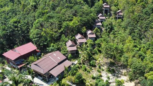 an overhead view of a group of houses in a forest at Sea Views bungalow kohrong in Koh Rong Island