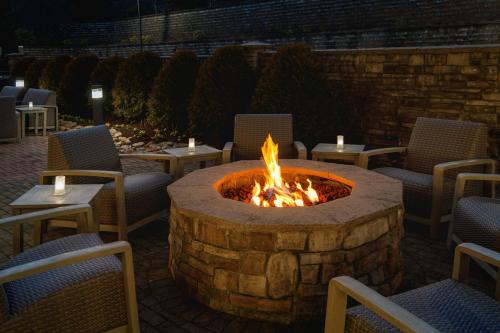 a fire pit in the middle of a patio at Courtyard by Marriott Boone in Boone