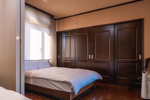 GARDENIA Ocean Front Tsudaにあるベッド