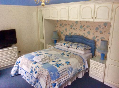 Ένα ή περισσότερα κρεβάτια σε δωμάτιο στο Tanamara Guest House