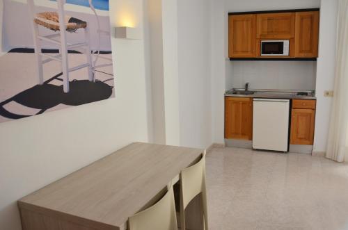 Кухня или мини-кухня в Apartamentos Vibra Panoramic

