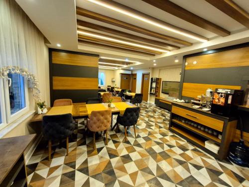a conference room with a table and chairs at Toprak Otel in Antalya