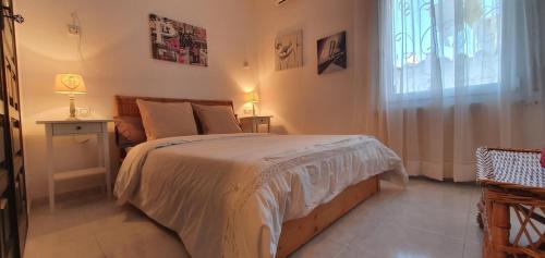 Кровать или кровати в номере Beautiful villa with swimming pool