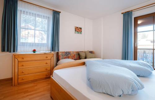 Postel nebo postele na pokoji v ubytování Binterhof