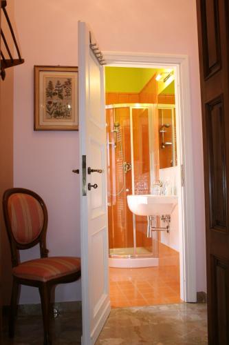 a bathroom with a shower and a sink at Corte dei Galli B&B in Sesto Fiorentino