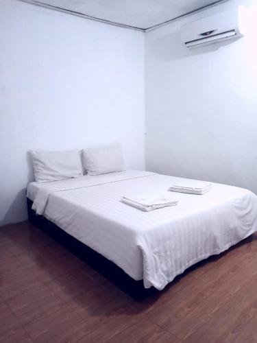 Katil atau katil-katil dalam bilik di Vang Vieng Lily Backpackers Hostel