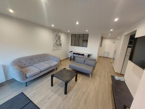 Appartement avec terrasse dans la verdure