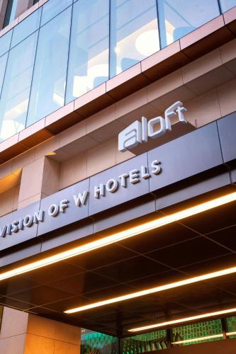 a sign on the side of a building at Aloft Seoul Gangnam in Seoul