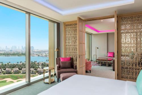 a hotel room with a view of the water at Aloft Dubai Creek in Dubai