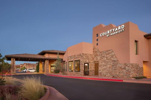 a building with a sign that reads i courtyard marriott at Courtyard by Marriott Sedona in Sedona