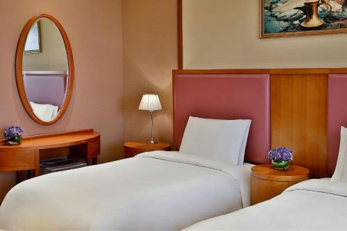 Ένα ή περισσότερα κρεβάτια σε δωμάτιο στο The Ritz-Carlton, Riyadh