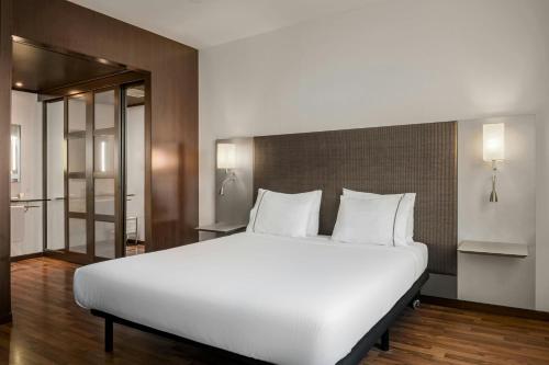 Postel nebo postele na pokoji v ubytování AC Hotel by Marriott Pisa