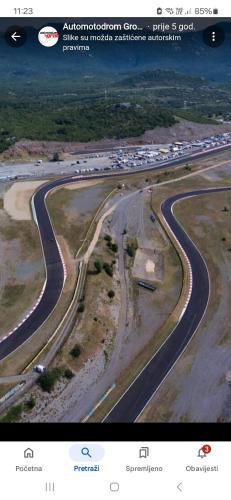an aerial view of a winding road with traffic at Apartman Hana u blizini Automotodroma Grobnik i Kostrenski plaža in Kostrena