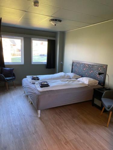 Postel nebo postele na pokoji v ubytování Gjøa Motell