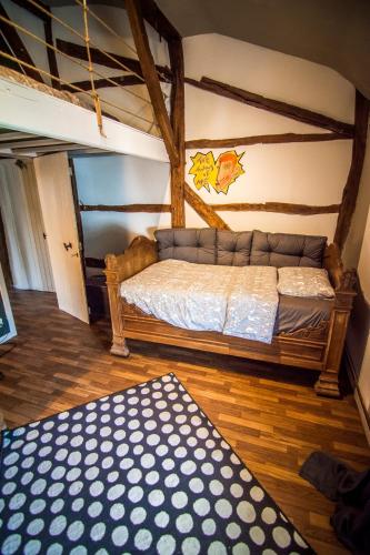 Una cama o camas en una habitación de House of Ardennes and flowery charm