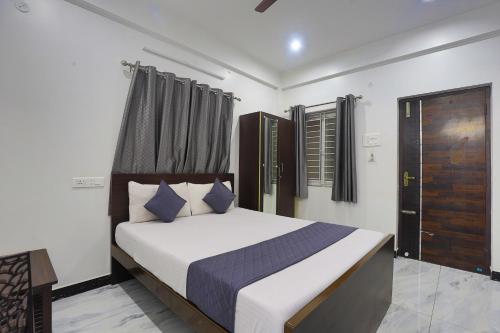 Katil atau katil-katil dalam bilik di Hotel AR Residency