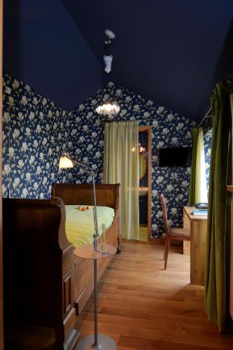 Ein Bett oder Betten in einem Zimmer der Unterkunft Epicerie am Duerf