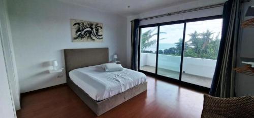 Postel nebo postele na pokoji v ubytování Luxury Villas