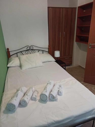 Ένα ή περισσότερα κρεβάτια σε δωμάτιο στο M&M Cozy Apartment 1