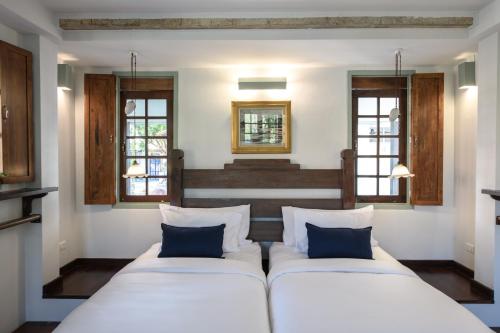 Ένα ή περισσότερα κρεβάτια σε δωμάτιο στο Villa Pateh