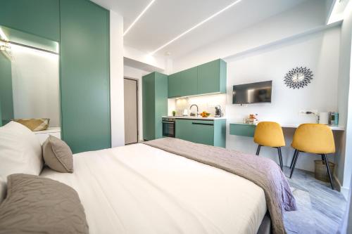 Postel nebo postele na pokoji v ubytování Amelia luxury Suites