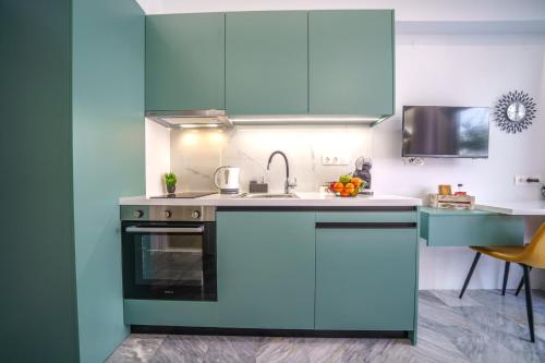 Kuchyň nebo kuchyňský kout v ubytování Amelia luxury Suites