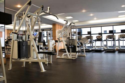 a gym with several treadmills and tread machines at Renaissance São Paulo Hotel in Sao Paulo
