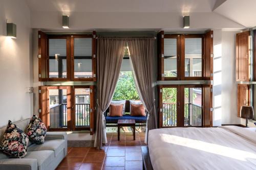 Ένα ή περισσότερα κρεβάτια σε δωμάτιο στο Villa Pateh