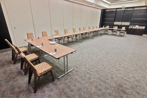 a row of tables and chairs in a room at Sheraton Quito in Quito